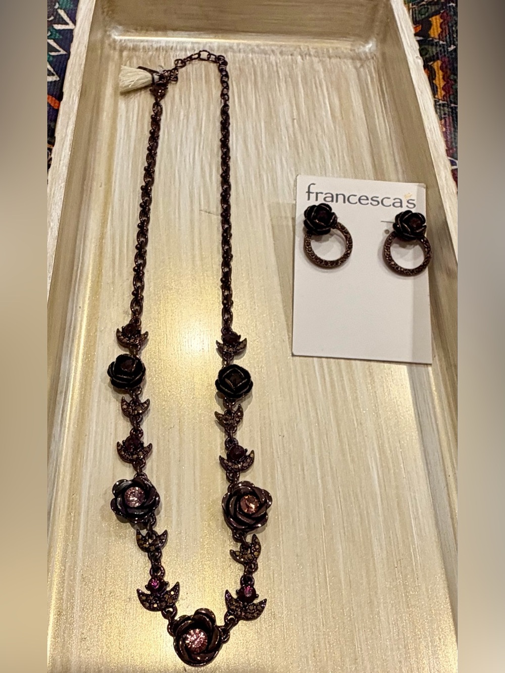 Beautiful dark brown with burgandy stones chain with matching earrings